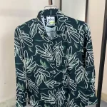 Forest green men's shirt with white leaf contour patterns on premium Jafran fabric.