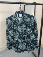 Forest green men's shirt with white leaf contour patterns on premium Jafran fabric.