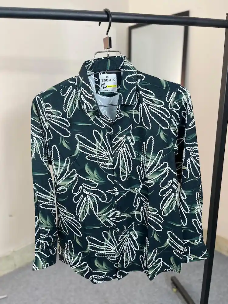 Forest green men's shirt with white leaf contour patterns on premium Jafran fabric.