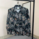 Premium black shirt with red and white nebula style abstract print on Chelli fabric.