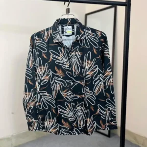 Premium black shirt with red and white nebula style abstract print on Chelli fabric.