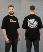 Menzoa Premium Sacrifice with Grace religious-themed black t-shirt featuring a man and a cow illustration.