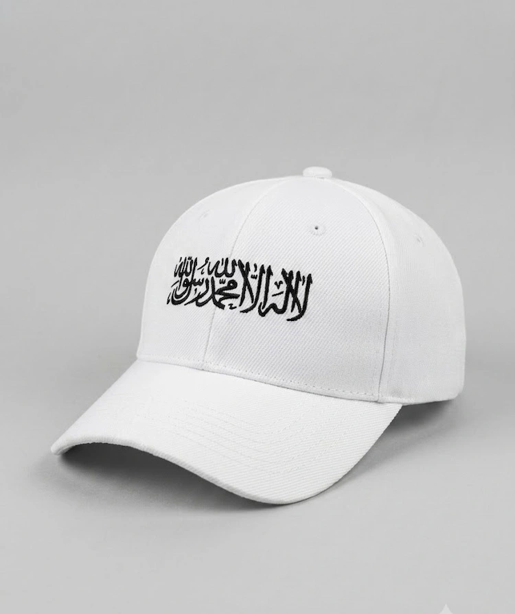 white-kalima-calligraphy-islamic-cap.jpg Pure white cap featuring holy Kalima Shahada Arabic calligraphy embroidery.